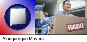 Albuquerque, New Mexico - movers unloading a moving van and carrying a fragile box