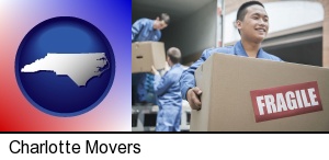 Charlotte, North Carolina - movers unloading a moving van and carrying a fragile box