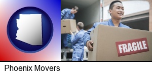 Phoenix, Arizona - movers unloading a moving van and carrying a fragile box