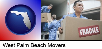 movers unloading a moving van and carrying a fragile box in West Palm Beach, FL