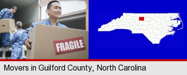 movers unloading a moving van and carrying a fragile box; Guilford County highlighted in red on a map