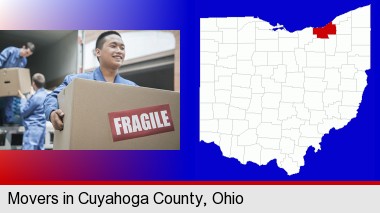 movers unloading a moving van and carrying a fragile box; Cuyahoga County highlighted in red on a map