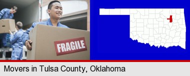 movers unloading a moving van and carrying a fragile box; Tulsa County highlighted in red on a map